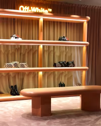 Off White: store with a backlit logo wall